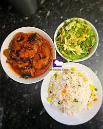 White Rice and stew, salad, and Titus Fish 